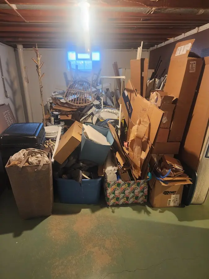 Roll-off dumpster container at job site for 15 Yard Dumpster Rental in Moline